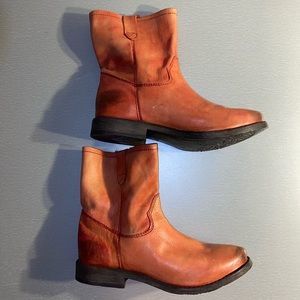 Handcrafted women’s red leather boots in size 8.5.